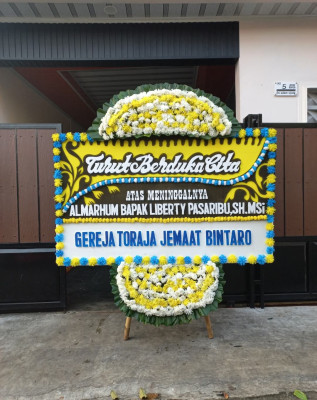 Papan Bunga Duka di Sungai Kasai